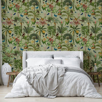 Whimsical jungle mural with pastel botanical elements.

