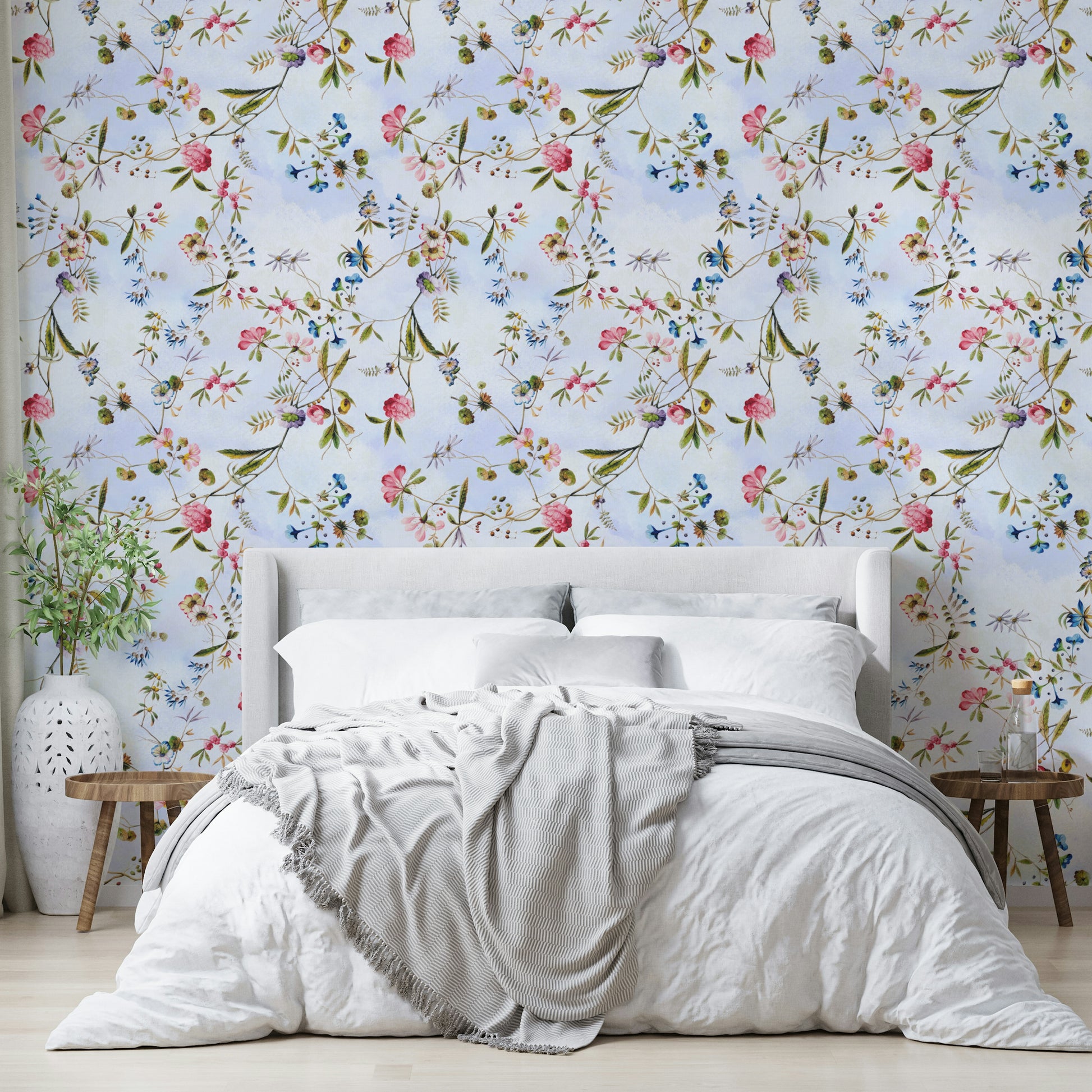Wallpaper with garden birds, leafy greens, and vivid flowers.

