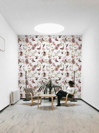 Garden-inspired wallpaper with bold blooms and flying insects.


