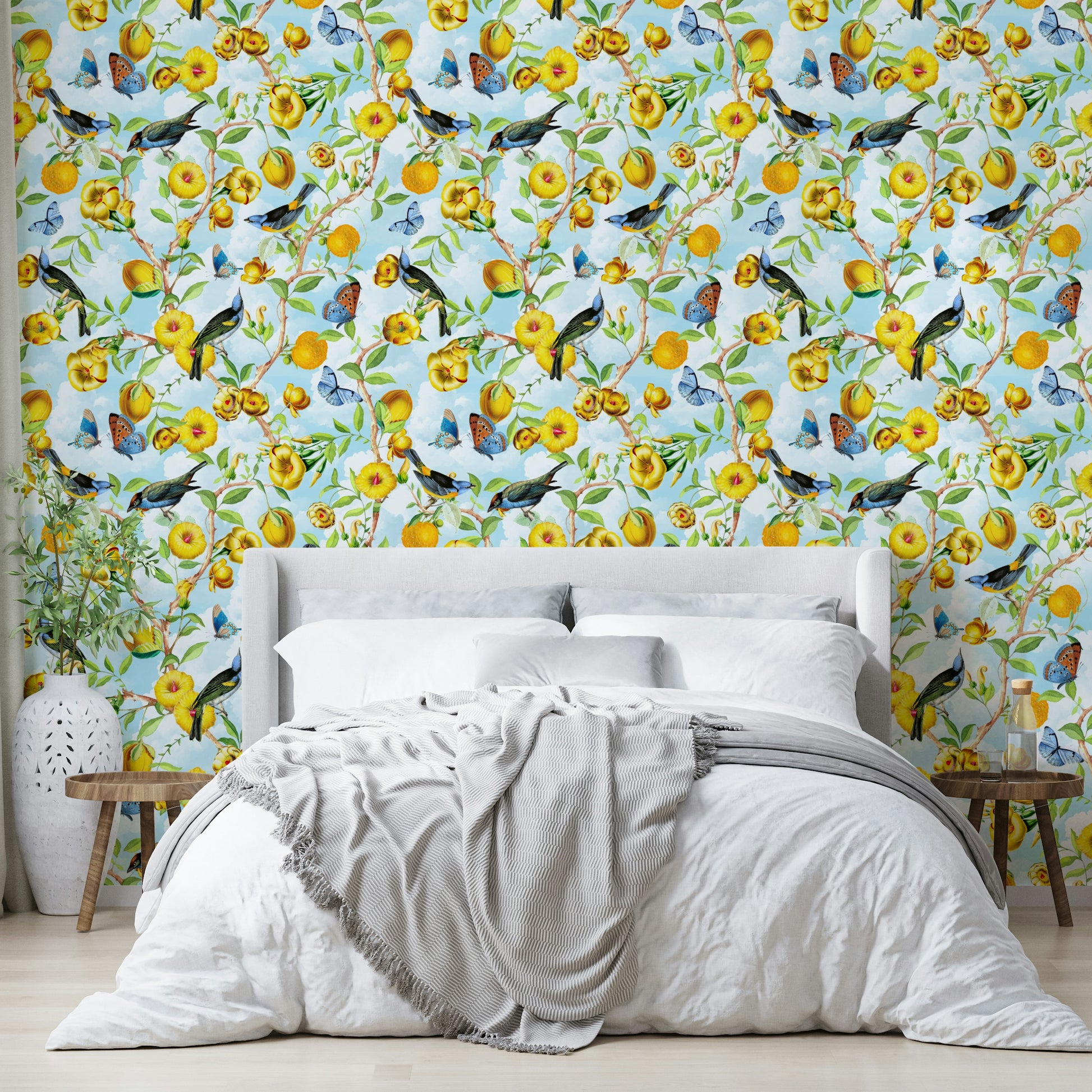 Bold tropical mural featuring jungle leaves and bright blooms.

