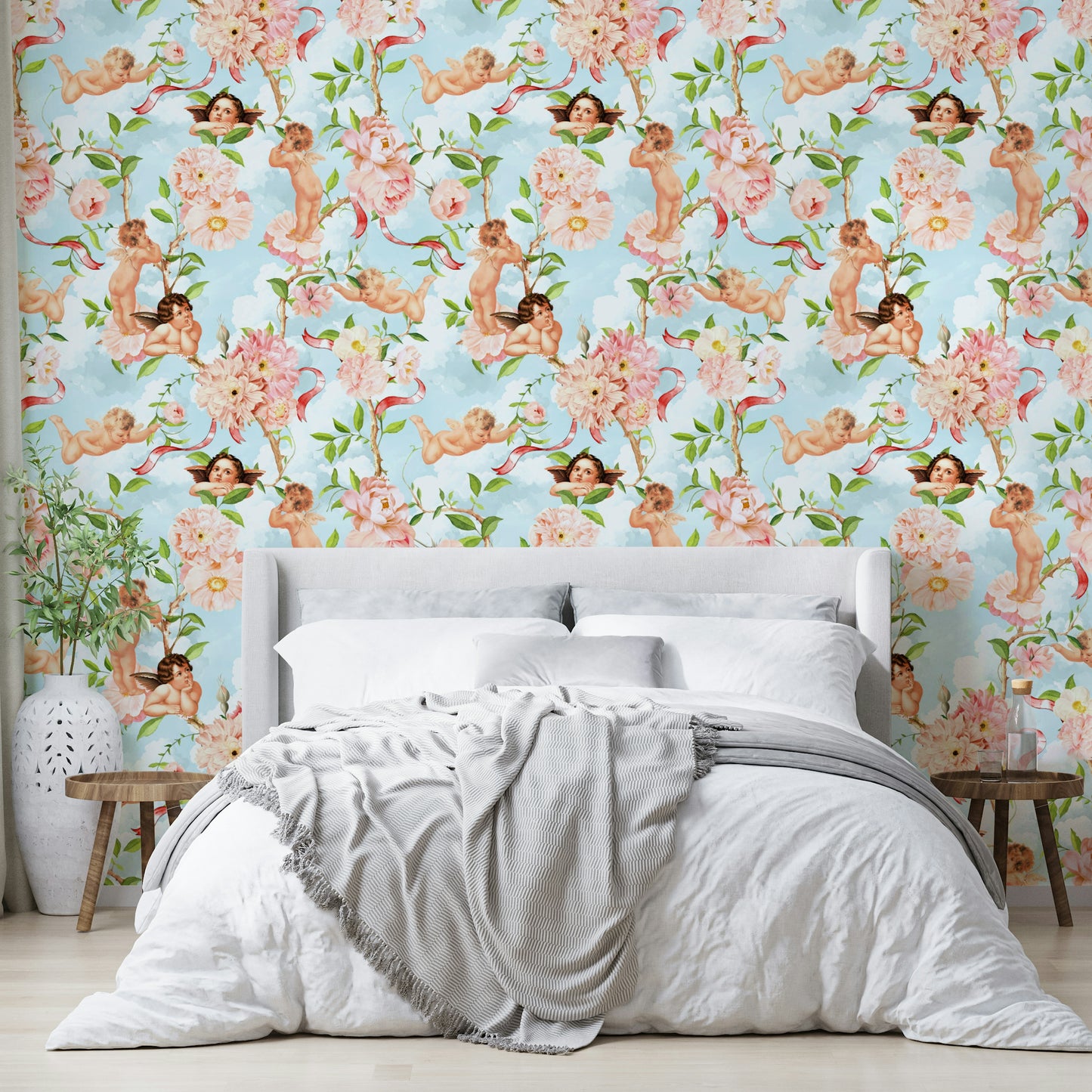 Dreamy wallpaper featuring cherubs among pastel clouds and flowers.

