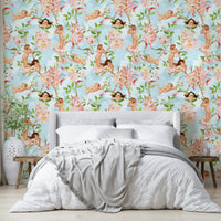 Dreamy wallpaper featuring cherubs among pastel clouds and flowers.

