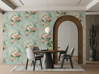 Close-up of floral clusters with pink roses and classic daisies.

