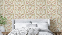 Rococo Romance Wallpaper with blush florals and birds on a cream base.

