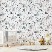 Cosmic mural with deep blue galaxies, bright planets, and sparkling stars.

