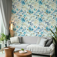 Wallpaper with elegant blue florals and natural leaf accents.

