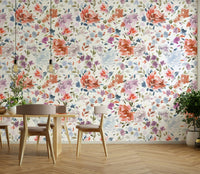 Watercolor floral design with rich, romantic red and blue roses.

