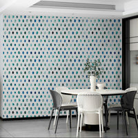 Hand-painted blue dots in various shades for a relaxing look.

