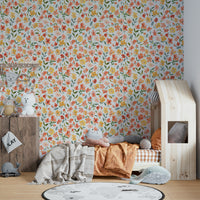 Wallpaper featuring hand-painted orange and yellow floral petals.

