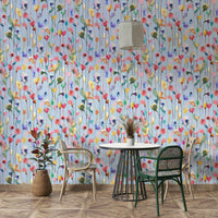 Elegant wallpaper with light blue artistic floral impressions.

