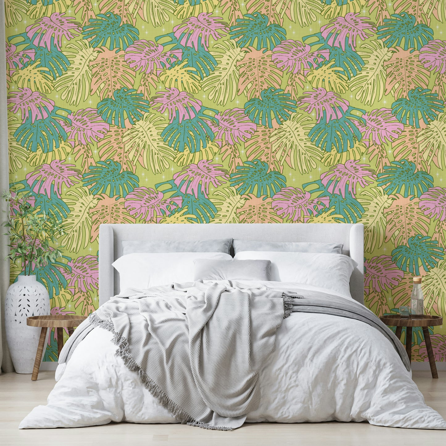 Retro-inspired wallpaper with tropical Monstera and palm leaves in pastel hues.

