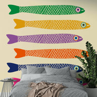 Colorful anchovies design on a neutral cream wall mural.

