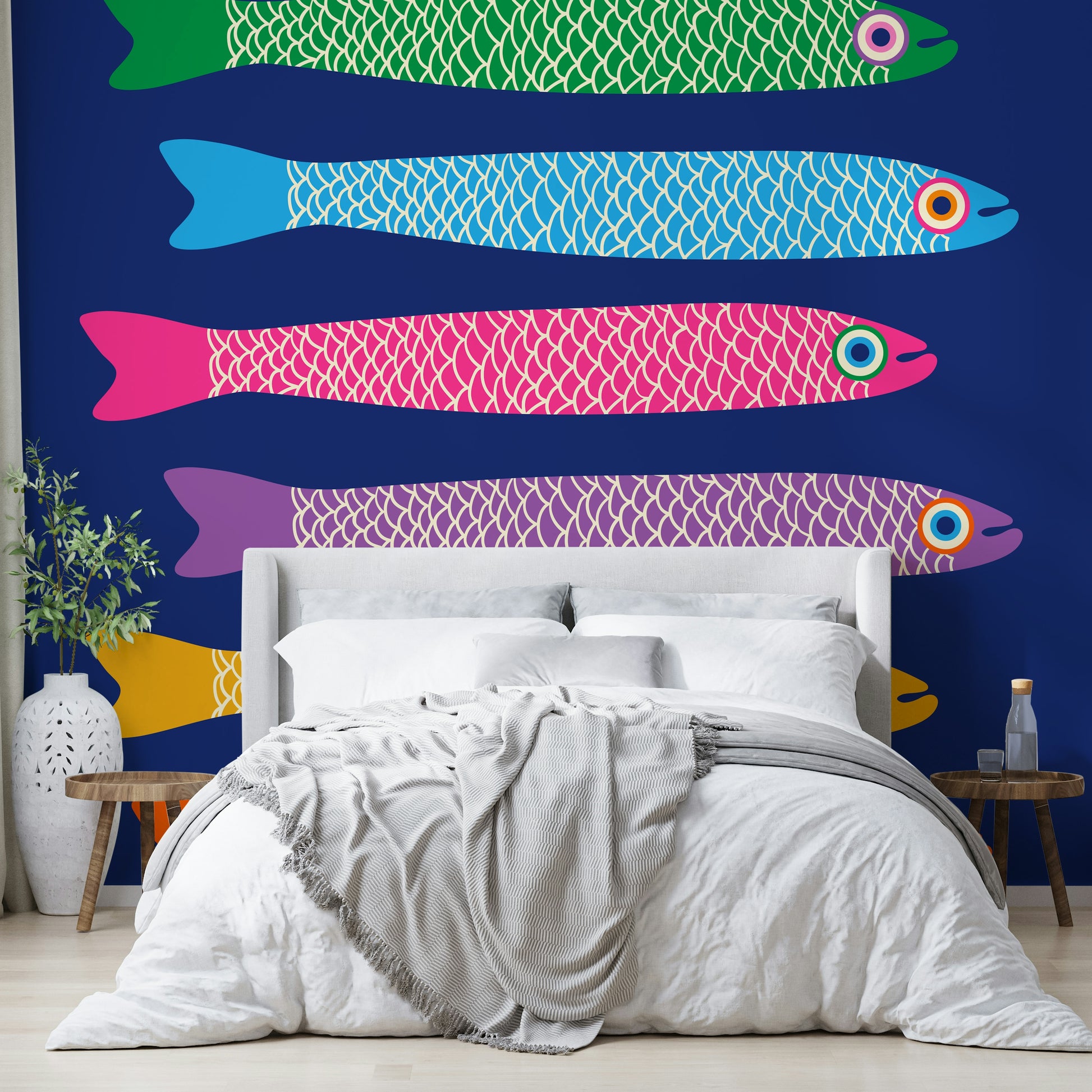 Vibrant fish mural with bright hues on a royal blue canvas.

