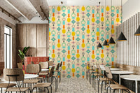 Cream-colored wallpaper with colorful geometric shapes in retro design.

