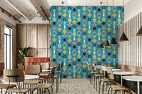 Wallpaper with geometric retro design and bright color contrasts on blue.

