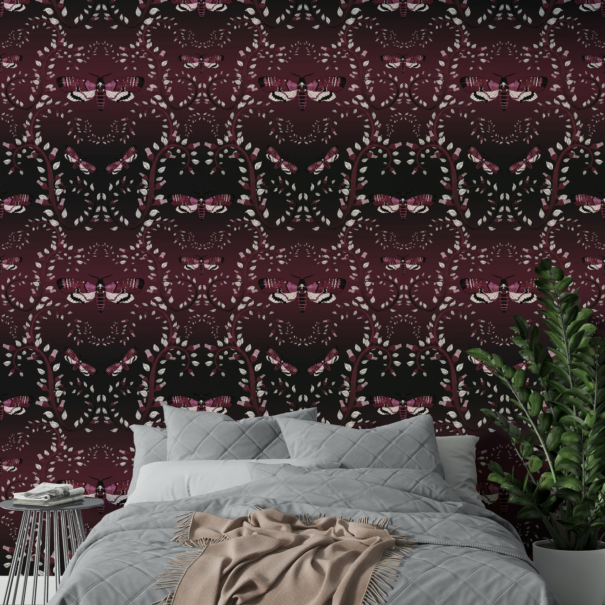Dark floral wallpaper with crimson insect accents


