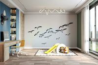 Birds in flight on a tranquil sky background in Flying Birds mural.


