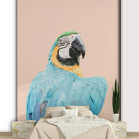 Exotic Blue Macaw perched on branch wall mural


