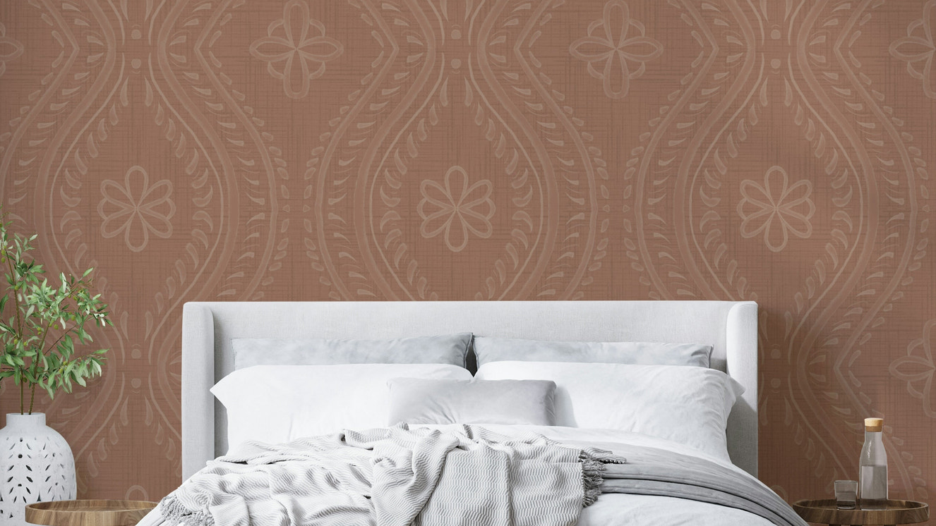 Warm-toned wallpaper with subtle ogee damask motif

