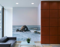 Ocean waves and coastal elements in the Coastal Heart mural.

