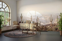 Tranquil desert landscape mural featuring warm earth tones and serene sky.

