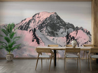 Serene snowcapped mountain mural with pinkish tones and sharp peaks.

