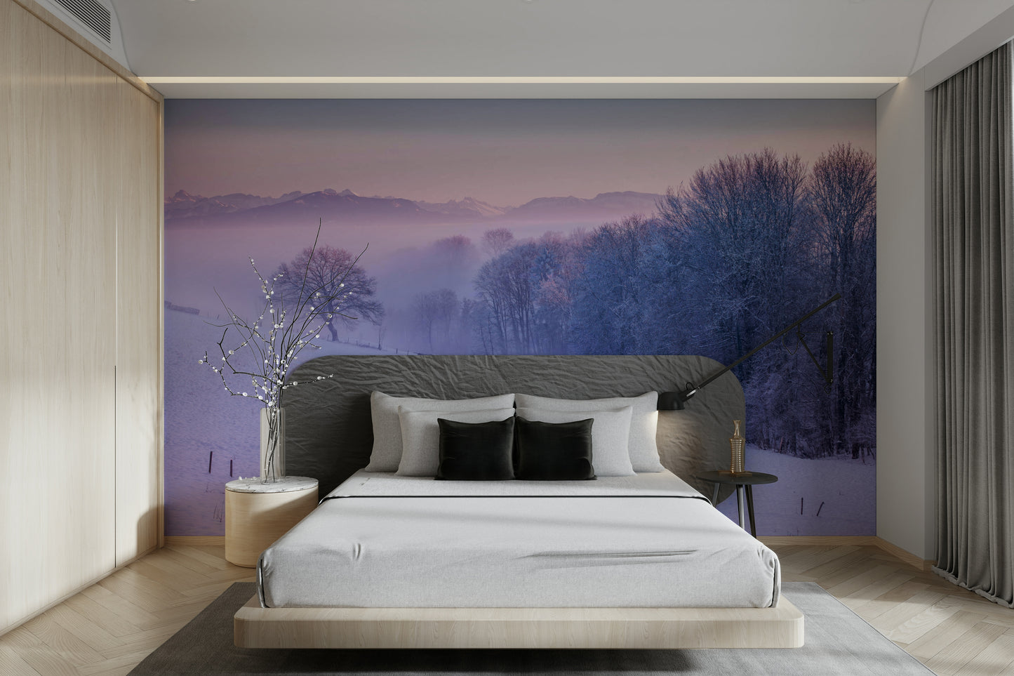 Snowy winter landscape mural featuring frosted trees and distant mountains.

