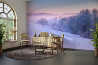 Wintery wall mural with frosted trees and cool, snowy tones.

