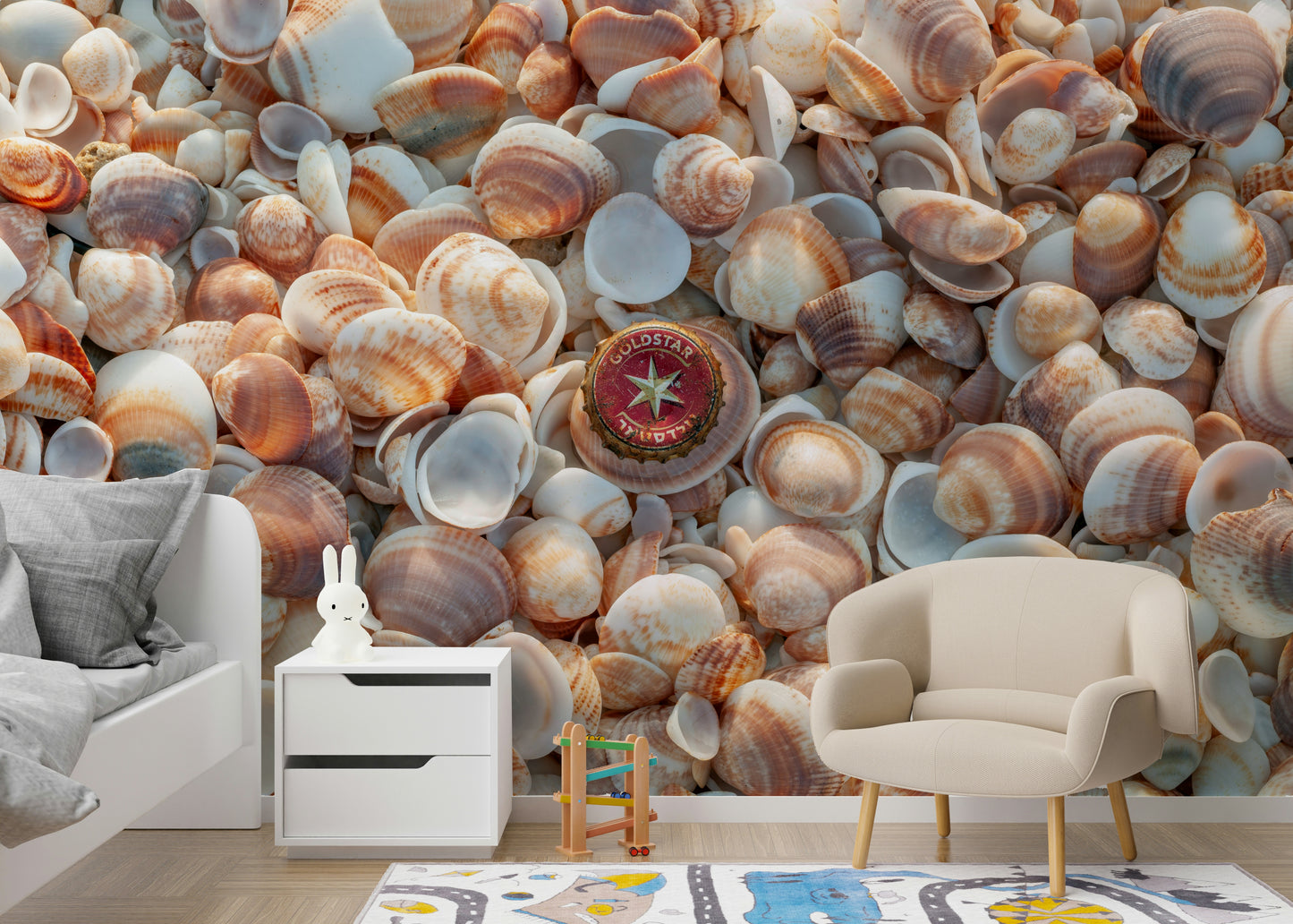 Beach-inspired wall mural with seashells and coastal treasures.

