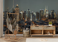 Urban New York City at night mural with city lights reflecting in the water.

