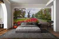 Field of tulips mural in front of spinning windmill

