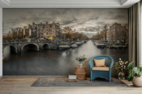 Sepia-toned Amsterdam mural with glowing windows


