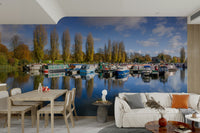 River marina mural with reflections and colorful boats

