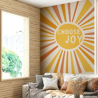 Colorful Choose Joy wall mural in yellow and orange hues

