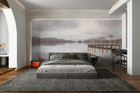 Peaceful pier wall art depicting serene waters and mountains.


