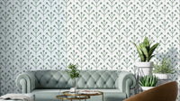Sage green botanical wallpaper with leafy design


