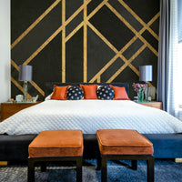 Art Deco black mural wallpaper with symmetrical design.

