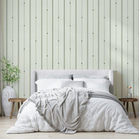Warm and calming buttercream and olive striped wallpaper

