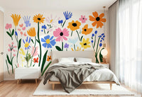 Vibrant floral mural in red, blue, and yellow

