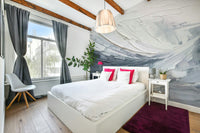 Layered gray wall art for sophisticated interiors

