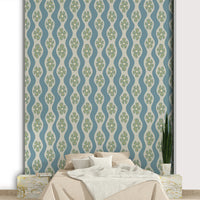 Soft blue wallpaper with mid-century floral charm

