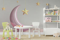 Close‑up of golden stars and pink moon wallpaper

