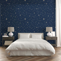 Scattered star pattern on warm background
