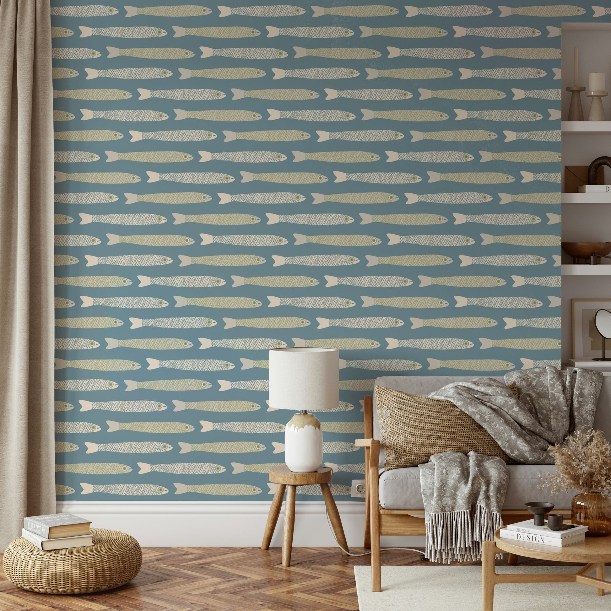Coastal wallpaper with soft blue and green tones featuring fish motifs

