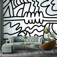Modern mural wallpaper featuring soft, flowing design elements

