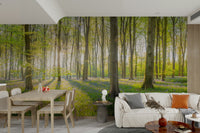 Bluebells and ferns in a glowing forest wall mural design

