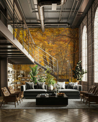 A forest path covered in fallen autumn leaves
