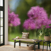 The dominant colors are soft shades of purple, green, and white.

