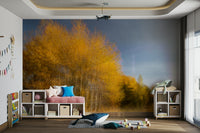 The room has a cozy, warm atmosphere due to the mural's colors.

