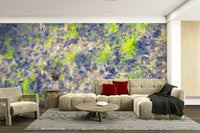 Lifestyle view with the mural behind a simple wooden desk and chair.

